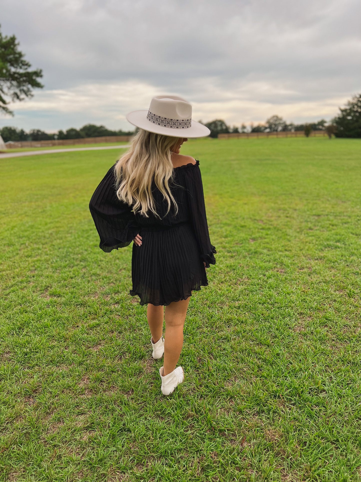 Pretty & Pleated Romper in Black